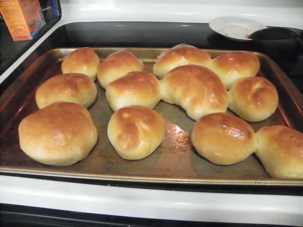 Image of homemade dinner rolls on a baking tray