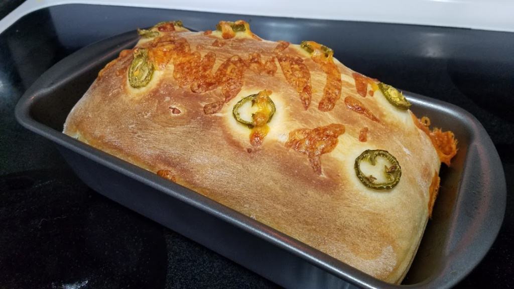 Image of jalapeno cheese bread in a bread pan