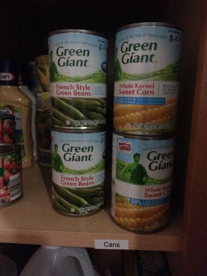 Image of canned goods in a pantry