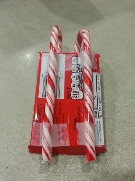 Looking for a creative and easy Christmas gift? These Candy Cane Sleds are great for Secret Santa gifts, neighbor gifts, and stocking stuffers!