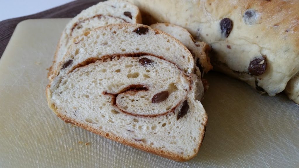 Cinnamon raisin bread on a cutting board