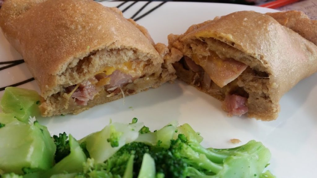Ham and cheese calzones are an easy and delicious way to use up extra ham! www.nogettingoffthistrain.com