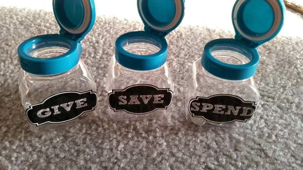 Want to teach your kids about money? Make these super easy Give Save Spend jars to show them how to handle money responsibly!