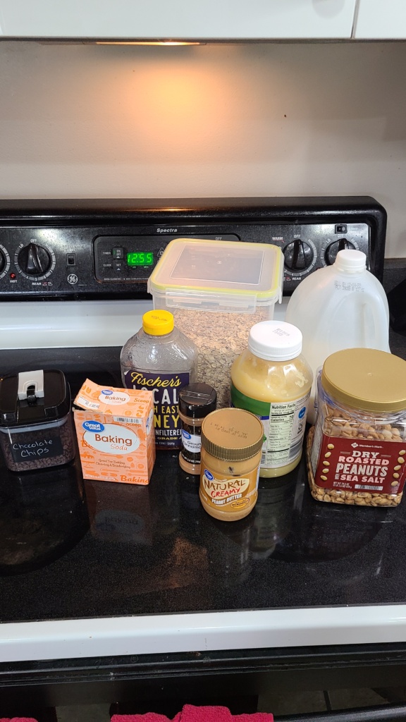 Ingredients for granola bars on a stovetop