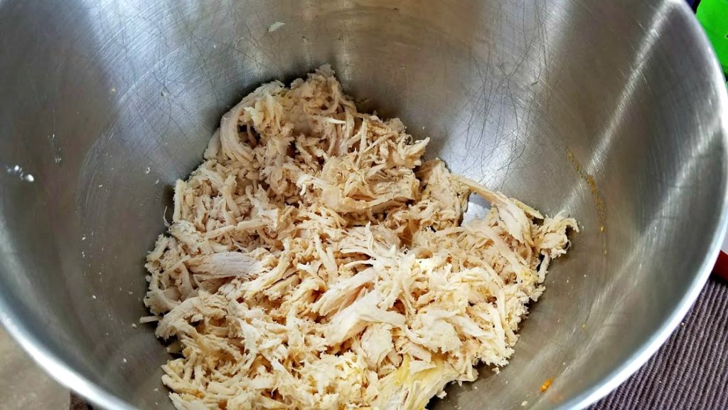 Image of shredded chicken in a large bowl