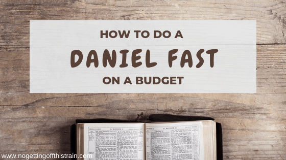 Image of an open bible with the title "How to do a Daniel Fast on a Budget"