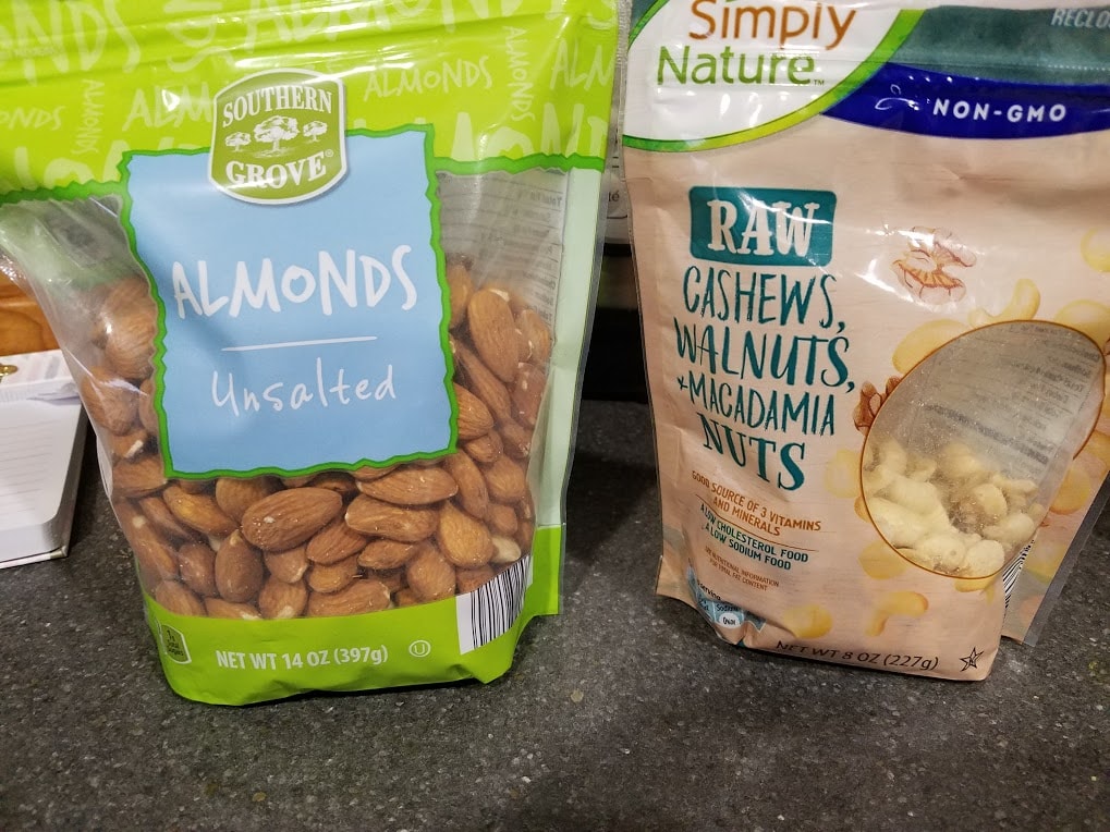 A bag of almonds and a bag of cashews