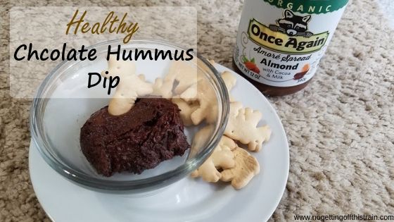 Image of chocolate hummus with animal crackers with the title "Healthy chocolate hummus dip"