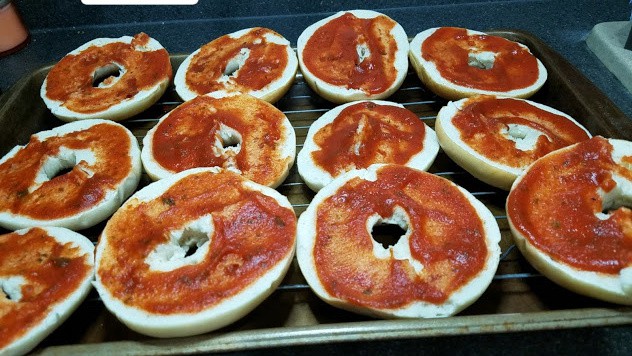 Image of bagels with pizza sauce