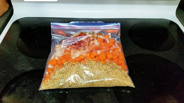 Uncooked lentil soup in a Ziploc bag