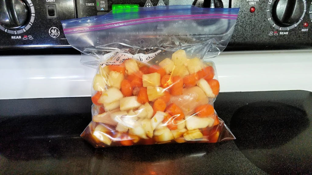 Image of chicken and vegetables in a freezer bag