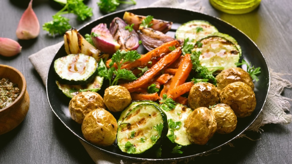 Roasted vegetables in a large serving bowl