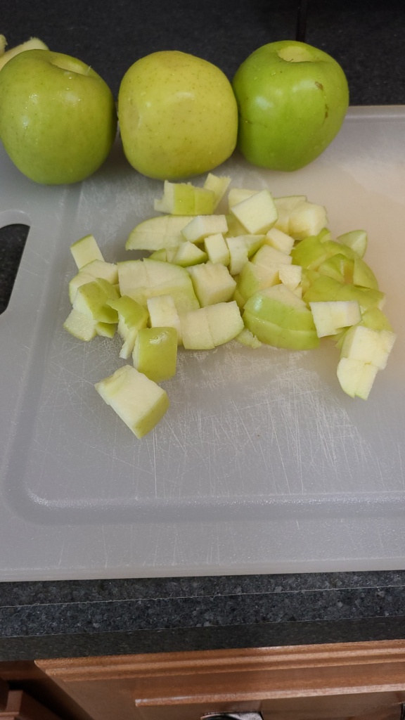 Diced apples on a cutting board