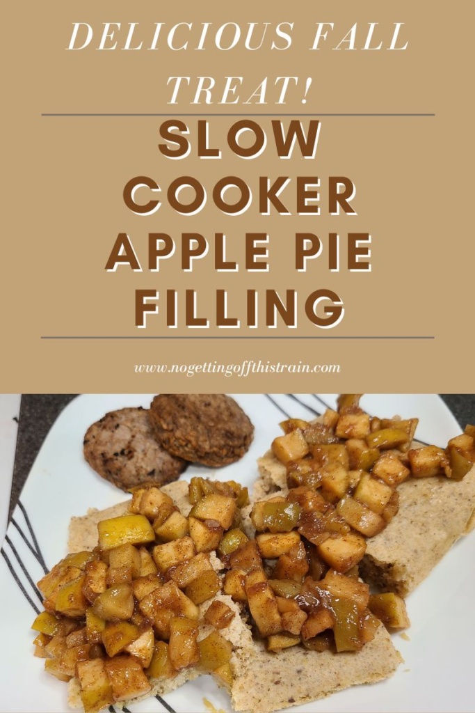 Cooked apple pie filling on top of pancakes, with text "Delicious fall treat! Slow cooker apple pie filling"
