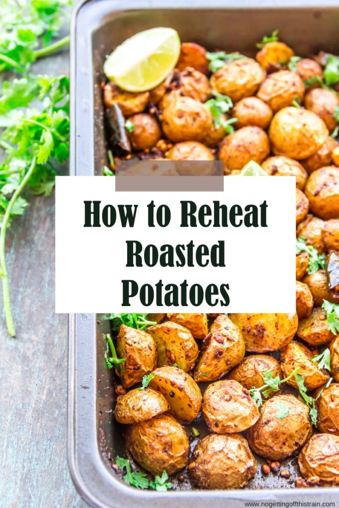 Roasted potatoes in a pan with text "How to reheat roasted potatoes"