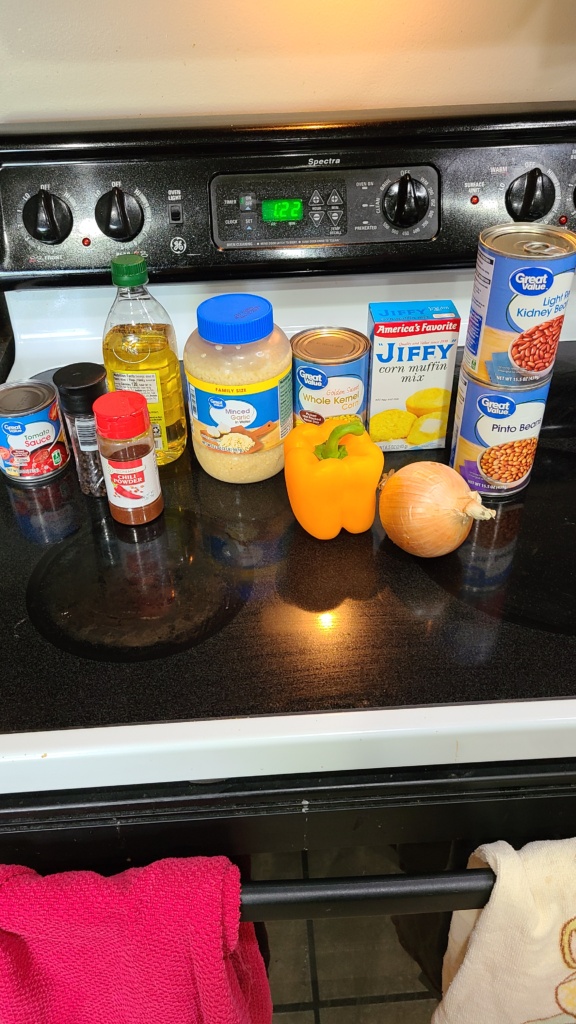 Ingredients for cornbread casserole on a stovetop