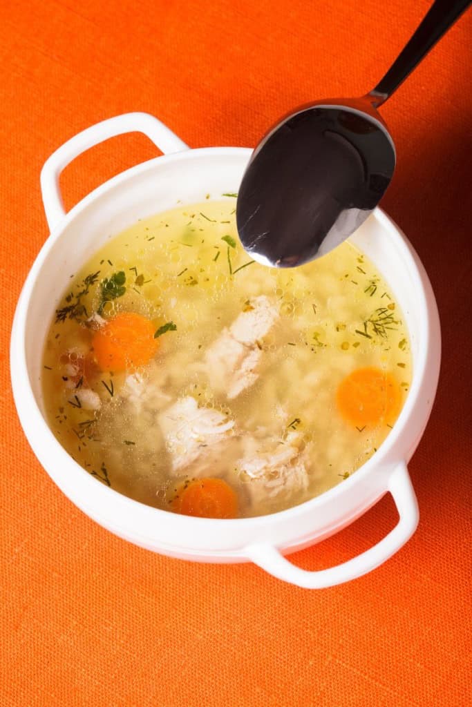 A bowl of chicken noodle soup