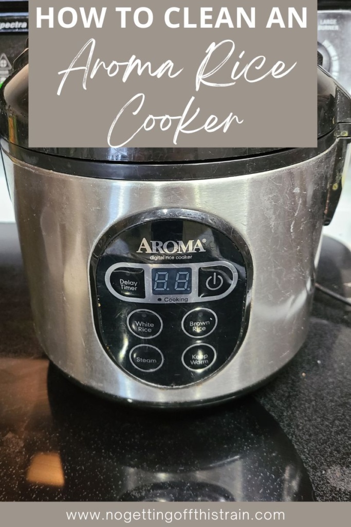 Rice cooker with text "How to clean an Aroma rice cooker"