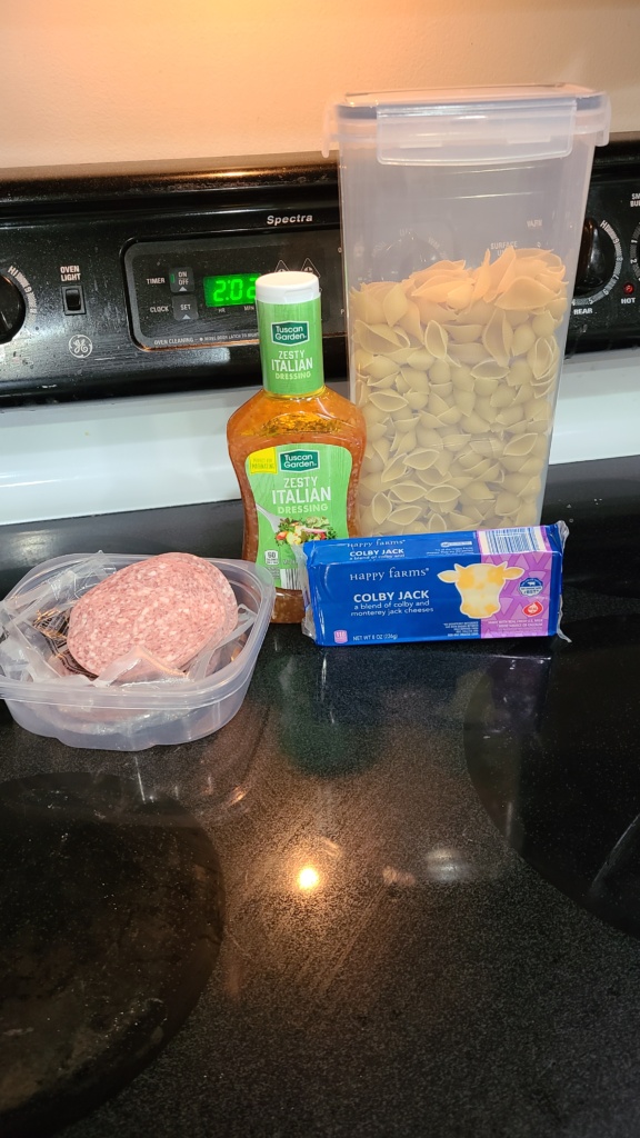 Ingredients for pasta salad on a stovetop