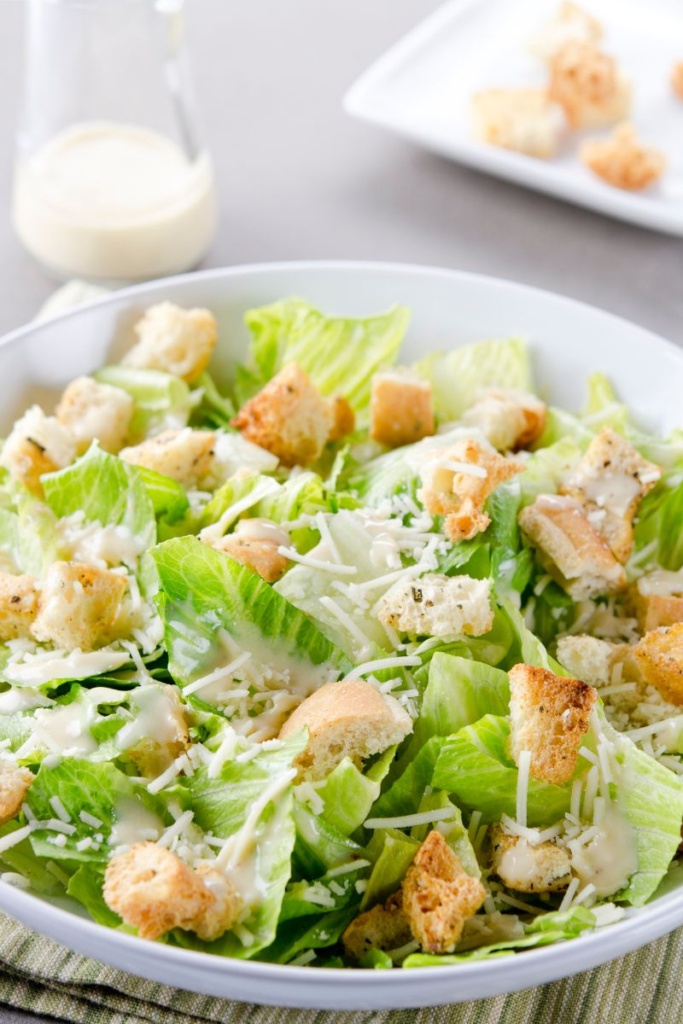 A Caesar salad in a salad bowl