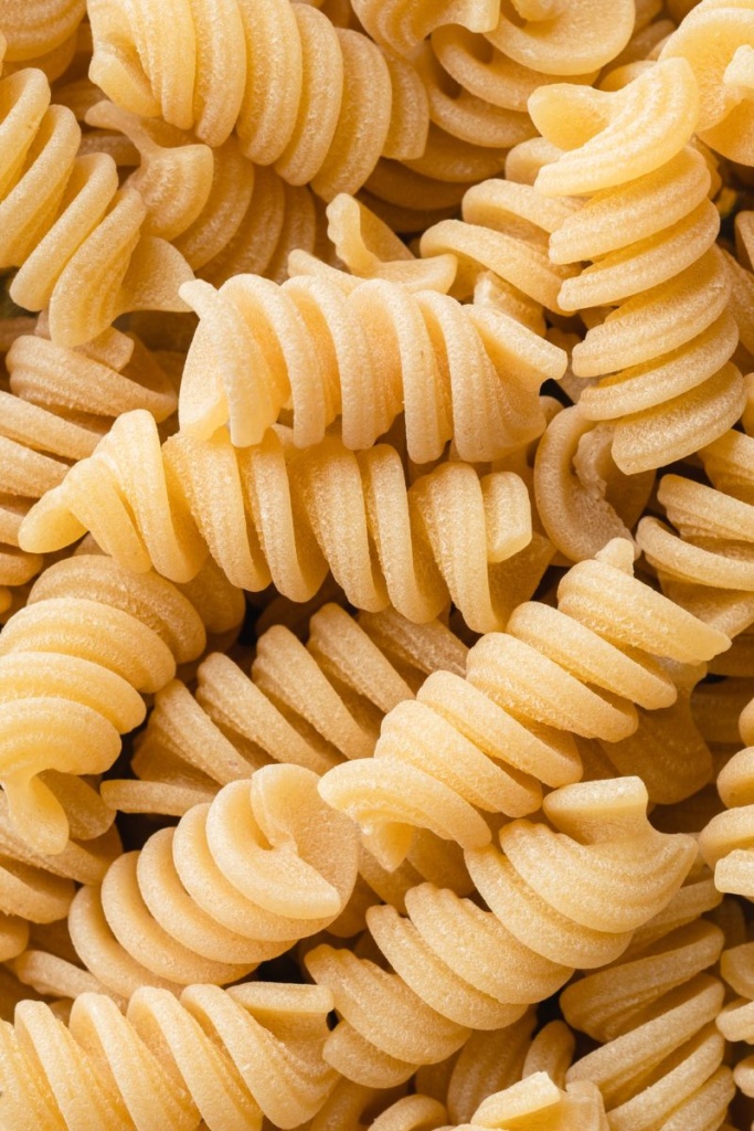 A close-up of dried spiral pasta