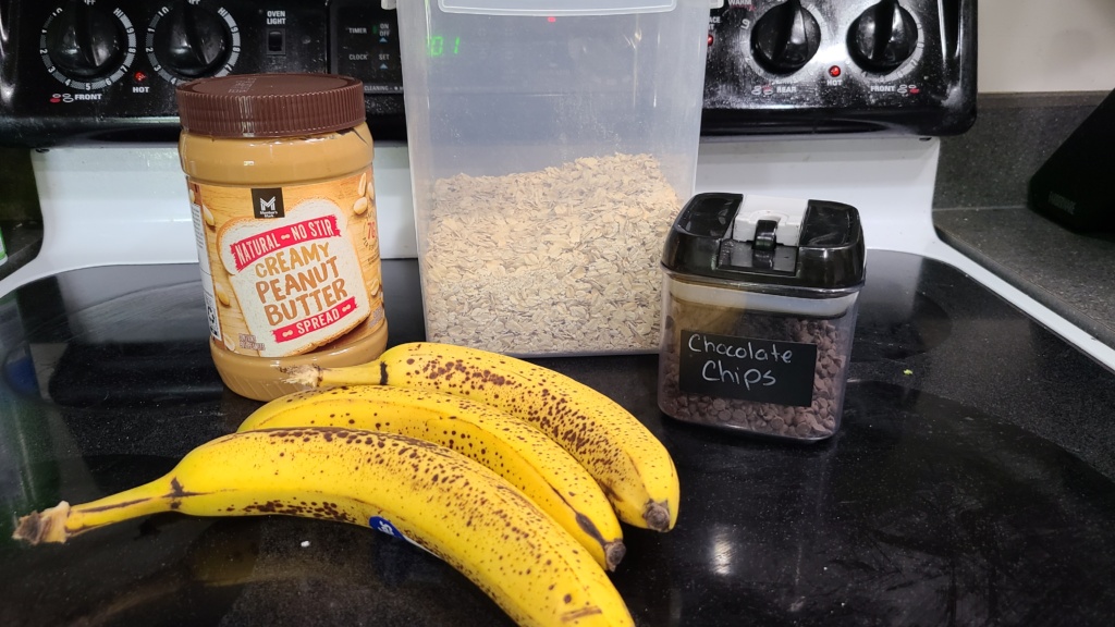 Ingredients for banana oatmeal bars, on a stovetop