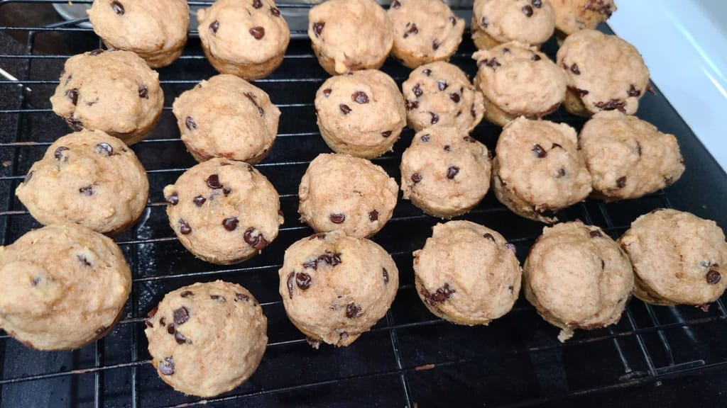 Mini banana muffins on a cooling rack