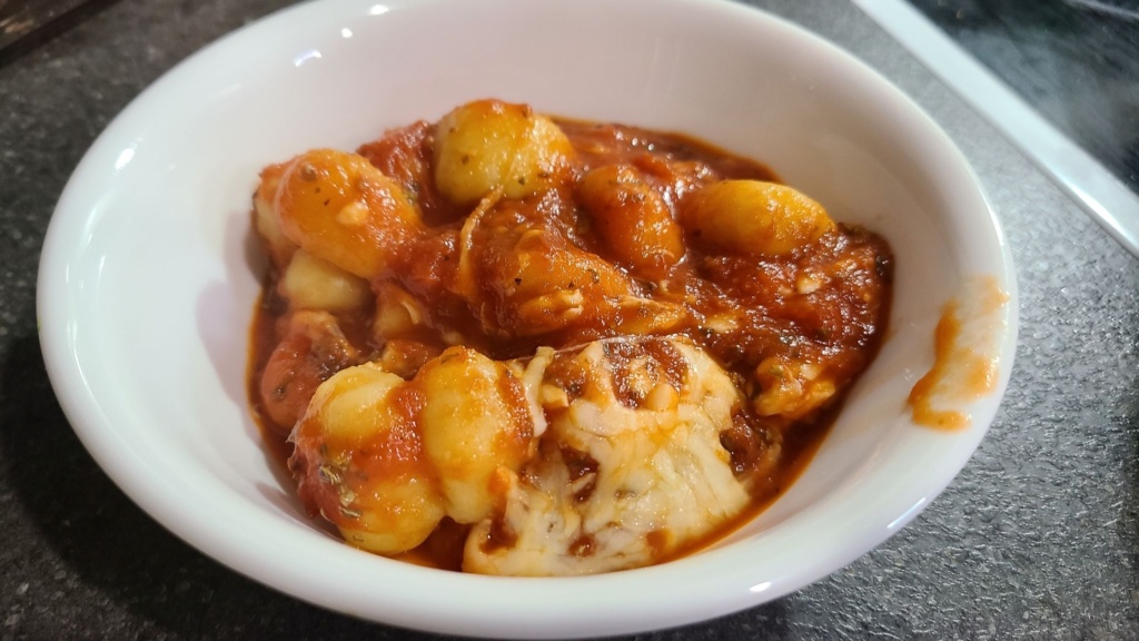 Baked gnocchi in a small bowl
