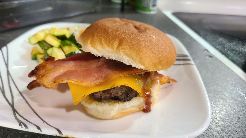 BBQ bacon burger on a plate