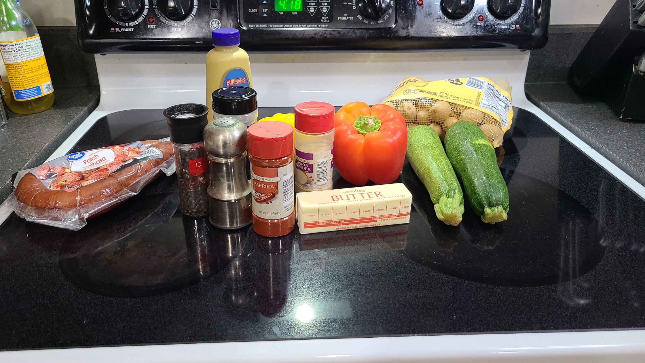 Ingredients for foil packet kielbasa, on a stovetop