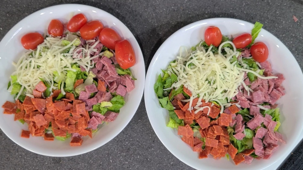 Two Italian sub salads in large bowls